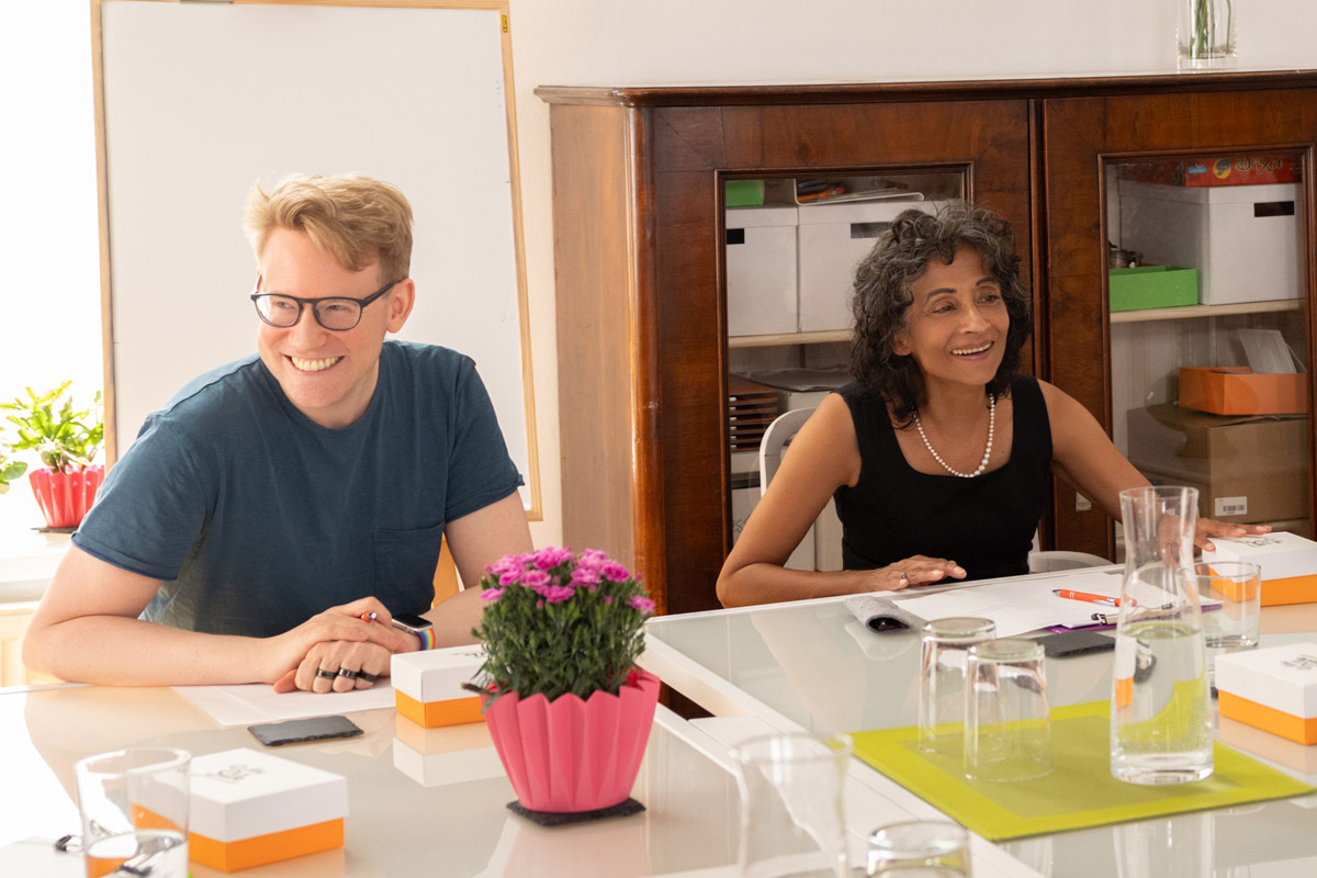 Michèle Cooke and Michael En laughing during a workshop.